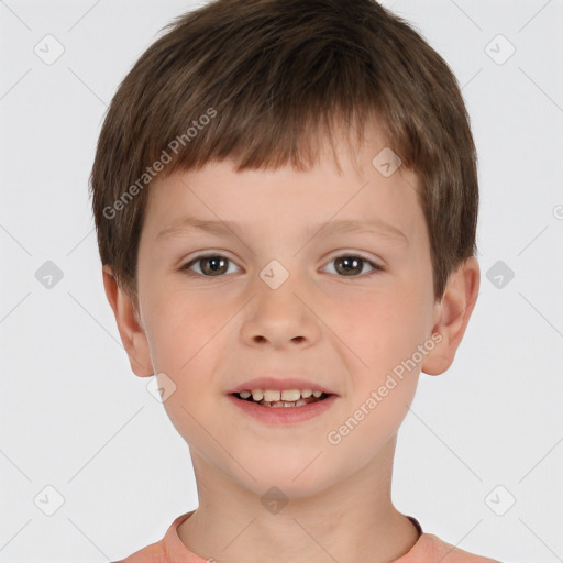 Joyful white child male with short  brown hair and brown eyes