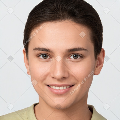 Joyful white young-adult female with short  brown hair and brown eyes