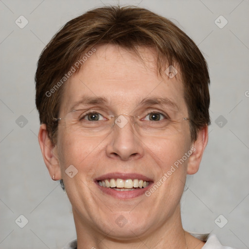 Joyful white adult male with short  brown hair and grey eyes