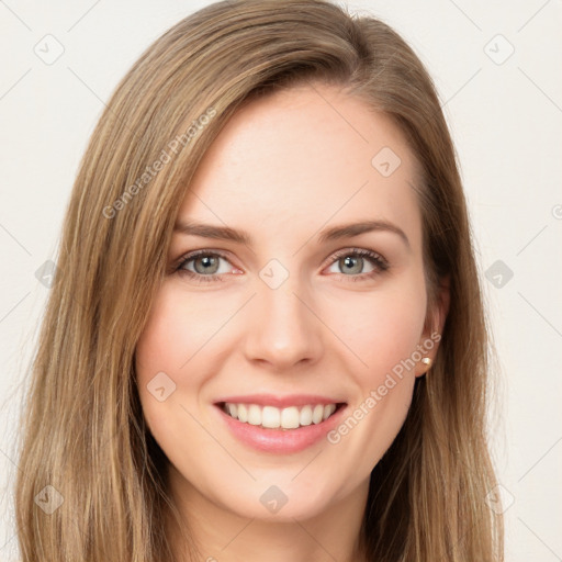 Joyful white young-adult female with long  brown hair and green eyes