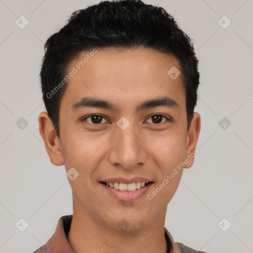 Joyful latino young-adult male with short  black hair and brown eyes