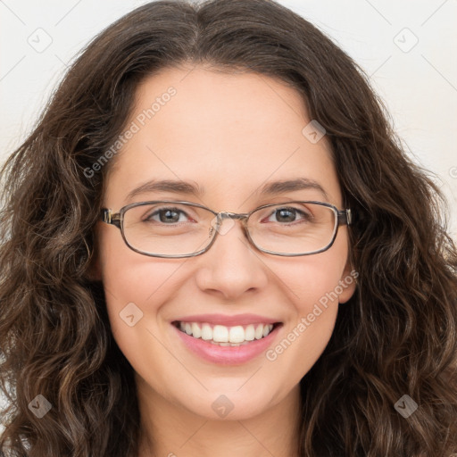 Joyful white young-adult female with long  brown hair and green eyes