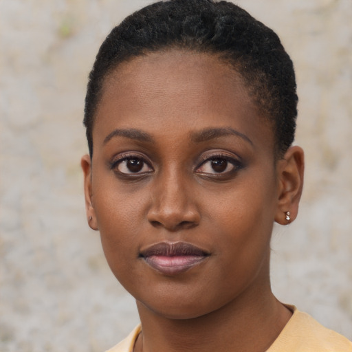 Neutral black young-adult female with short  brown hair and brown eyes