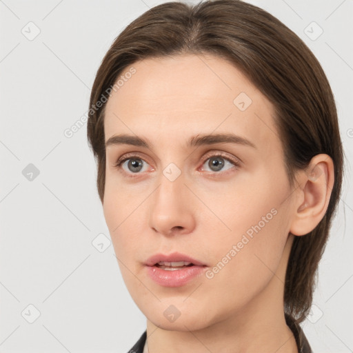 Neutral white young-adult female with medium  brown hair and brown eyes