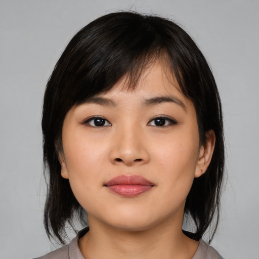 Neutral asian young-adult female with medium  black hair and brown eyes