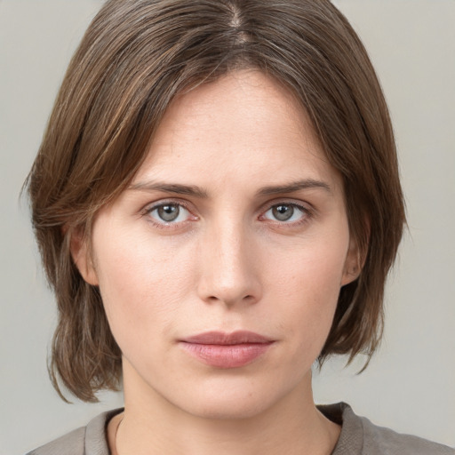 Neutral white young-adult female with medium  brown hair and grey eyes