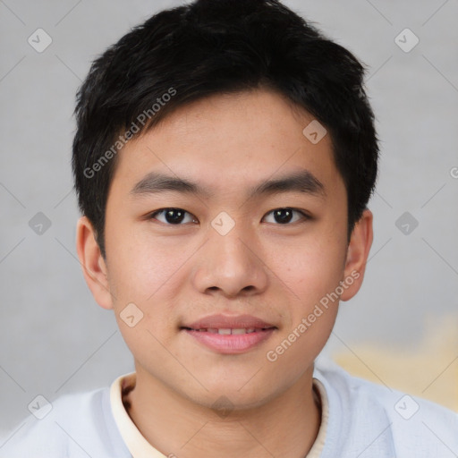 Joyful asian young-adult male with short  brown hair and brown eyes