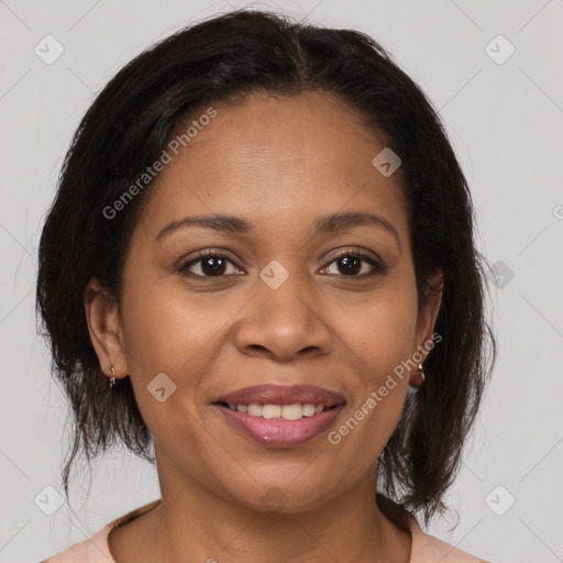 Joyful latino young-adult female with medium  brown hair and brown eyes