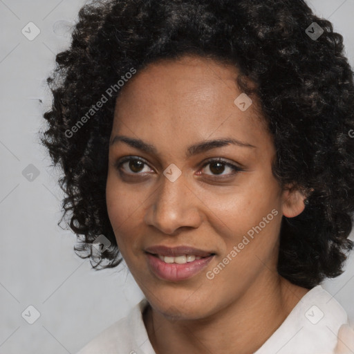 Joyful black young-adult female with medium  black hair and brown eyes