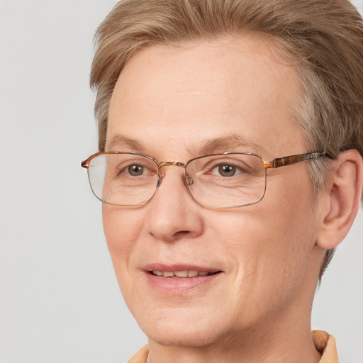 Joyful white middle-aged female with short  brown hair and brown eyes