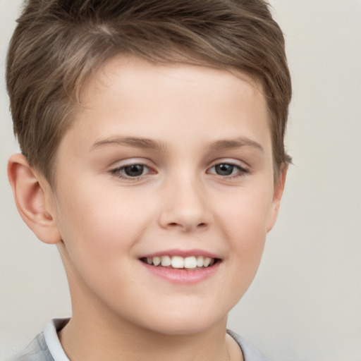 Joyful white child female with short  brown hair and brown eyes