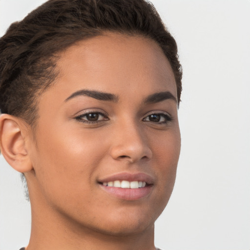 Joyful white young-adult female with short  brown hair and brown eyes