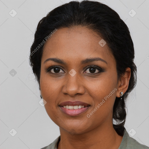 Joyful black young-adult female with medium  black hair and brown eyes