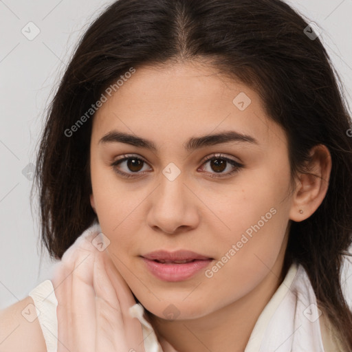 Joyful white young-adult female with long  brown hair and brown eyes