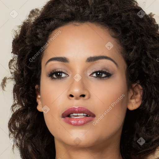 Joyful latino young-adult female with long  brown hair and brown eyes