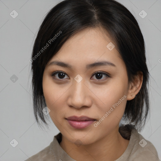 Joyful latino young-adult female with medium  black hair and brown eyes