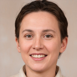 Joyful white young-adult female with medium  brown hair and brown eyes