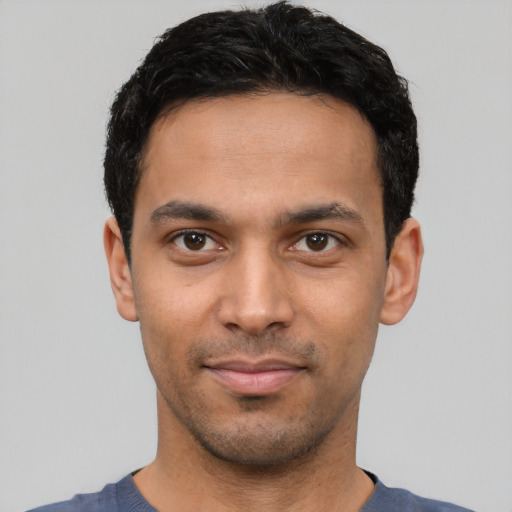 Neutral latino young-adult male with short  black hair and brown eyes