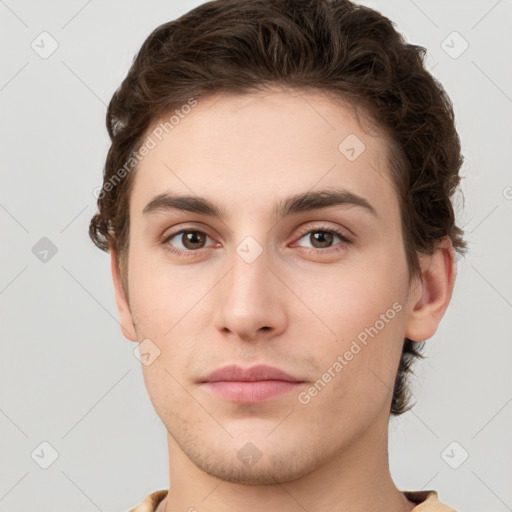 Neutral white young-adult male with short  brown hair and grey eyes