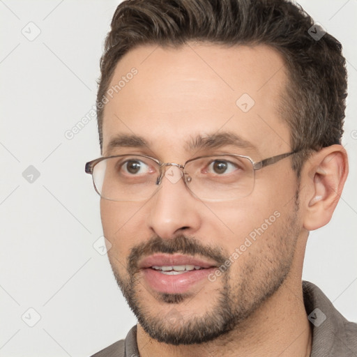 Joyful white adult male with short  brown hair and brown eyes