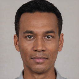 Neutral black young-adult male with short  black hair and brown eyes