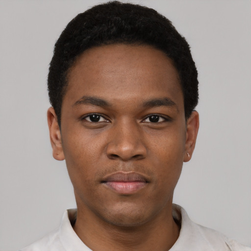 Neutral black young-adult male with short  black hair and brown eyes