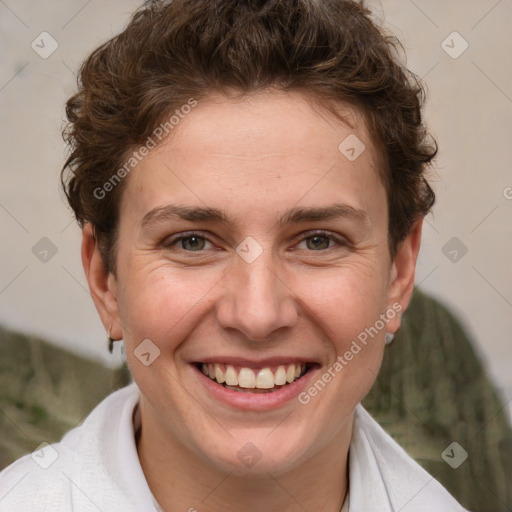 Joyful white adult female with short  brown hair and brown eyes