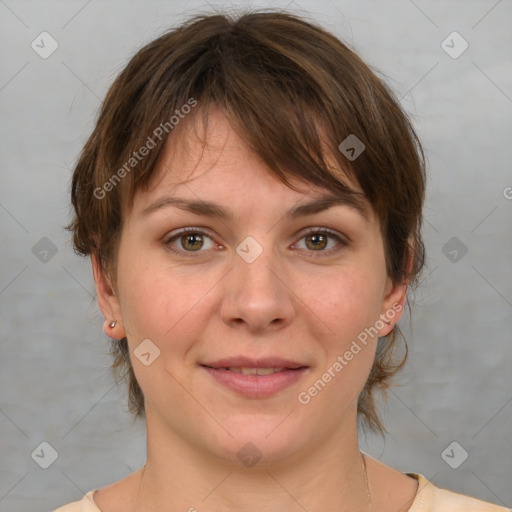 Joyful white young-adult female with medium  brown hair and brown eyes