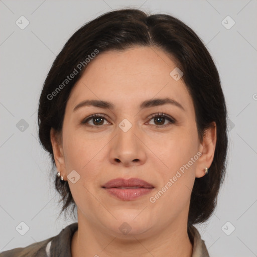 Joyful white adult female with medium  brown hair and brown eyes