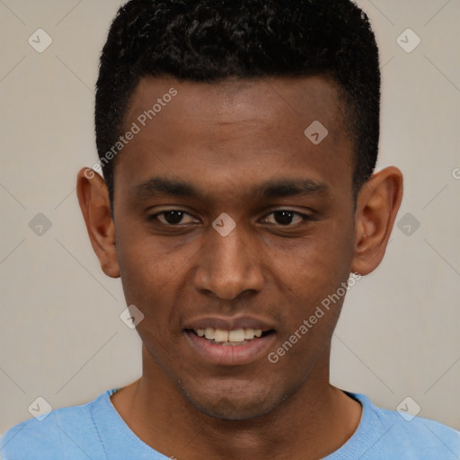 Joyful black young-adult male with short  brown hair and brown eyes