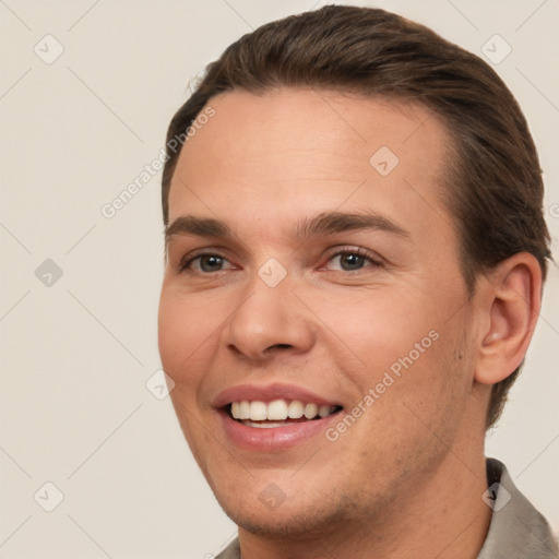 Joyful white young-adult female with short  brown hair and brown eyes