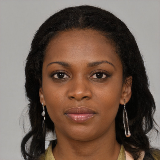 Neutral black young-adult female with long  black hair and brown eyes