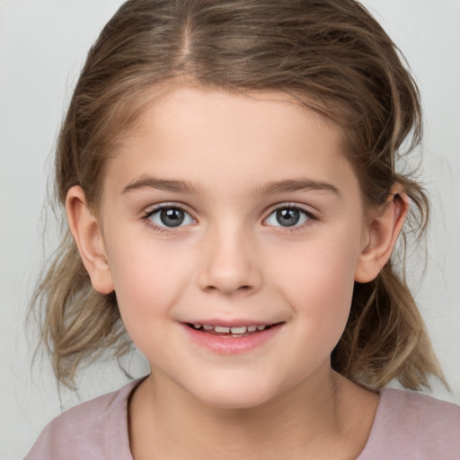 Joyful white child female with medium  brown hair and brown eyes