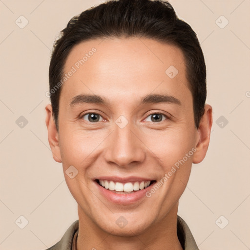 Joyful white young-adult male with short  brown hair and brown eyes