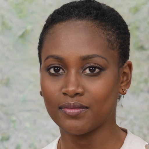 Neutral black young-adult female with short  brown hair and brown eyes