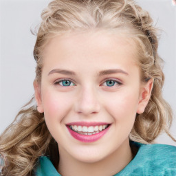 Joyful white child female with medium  brown hair and blue eyes