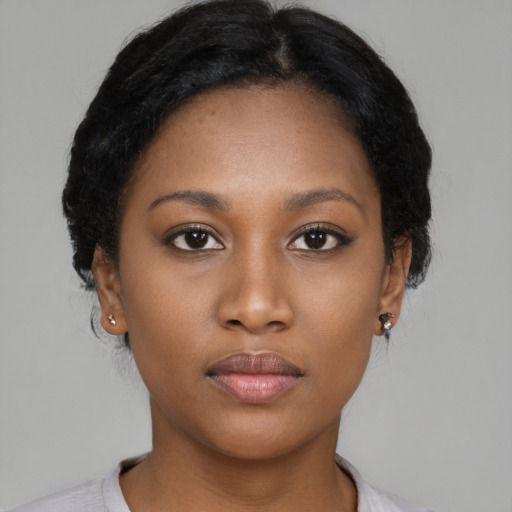 Neutral latino young-adult female with medium  brown hair and brown eyes
