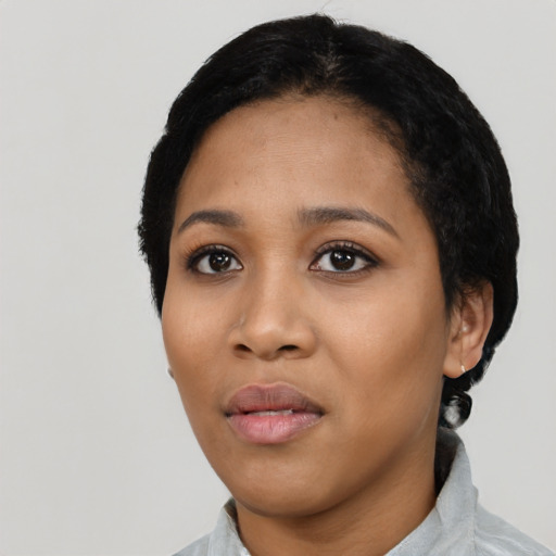 Neutral latino young-adult female with short  black hair and brown eyes