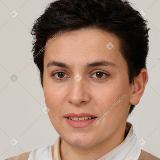 Joyful white adult female with short  brown hair and brown eyes