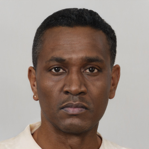 Neutral black young-adult male with short  black hair and brown eyes