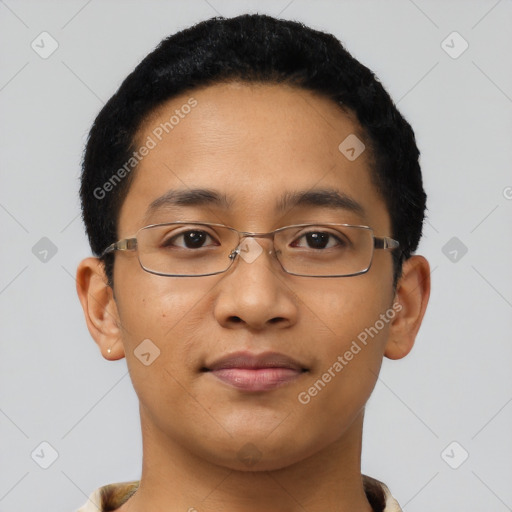 Joyful latino young-adult male with short  brown hair and brown eyes