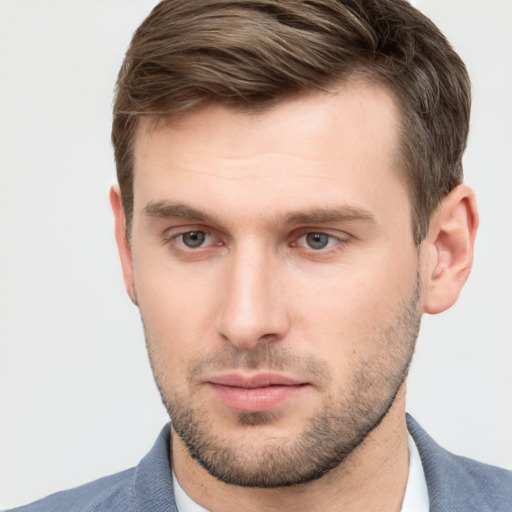 Neutral white young-adult male with short  brown hair and grey eyes