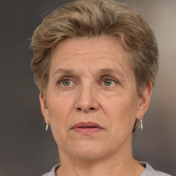 Joyful white middle-aged female with short  brown hair and brown eyes