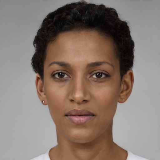 Neutral latino young-adult female with short  black hair and brown eyes