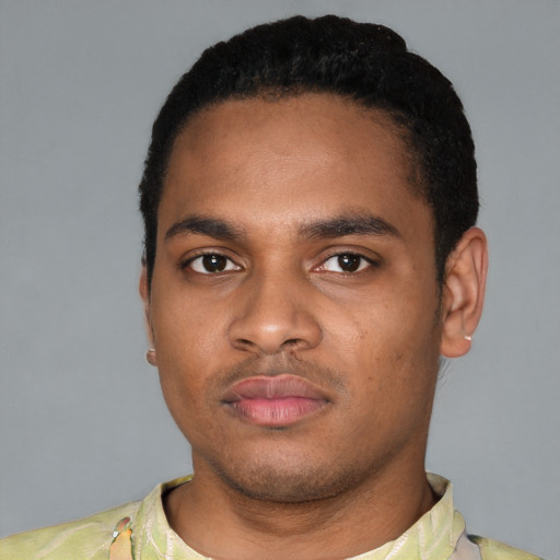 Neutral latino young-adult male with short  black hair and brown eyes