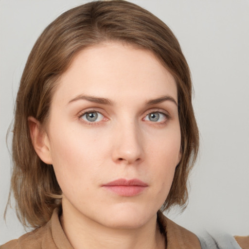 Neutral white young-adult female with medium  brown hair and grey eyes