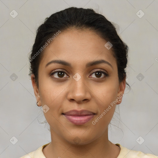 Joyful latino young-adult female with short  brown hair and brown eyes