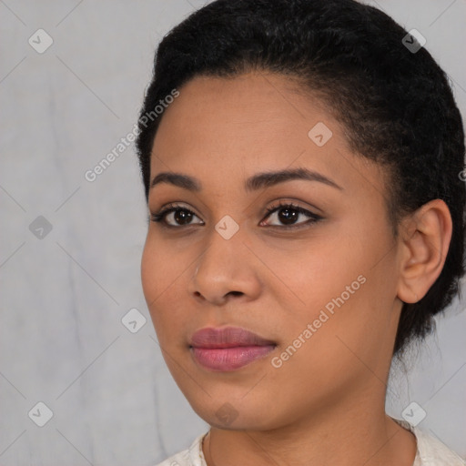 Joyful latino young-adult female with short  black hair and brown eyes