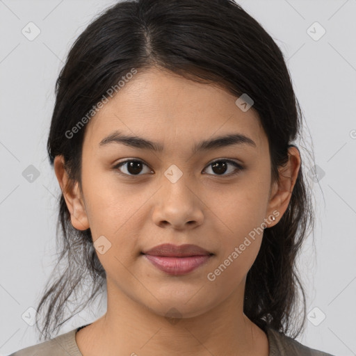 Joyful latino young-adult female with medium  brown hair and brown eyes