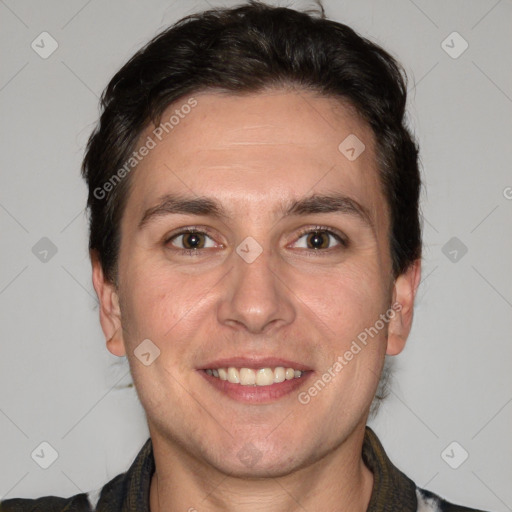 Joyful white adult male with short  brown hair and brown eyes